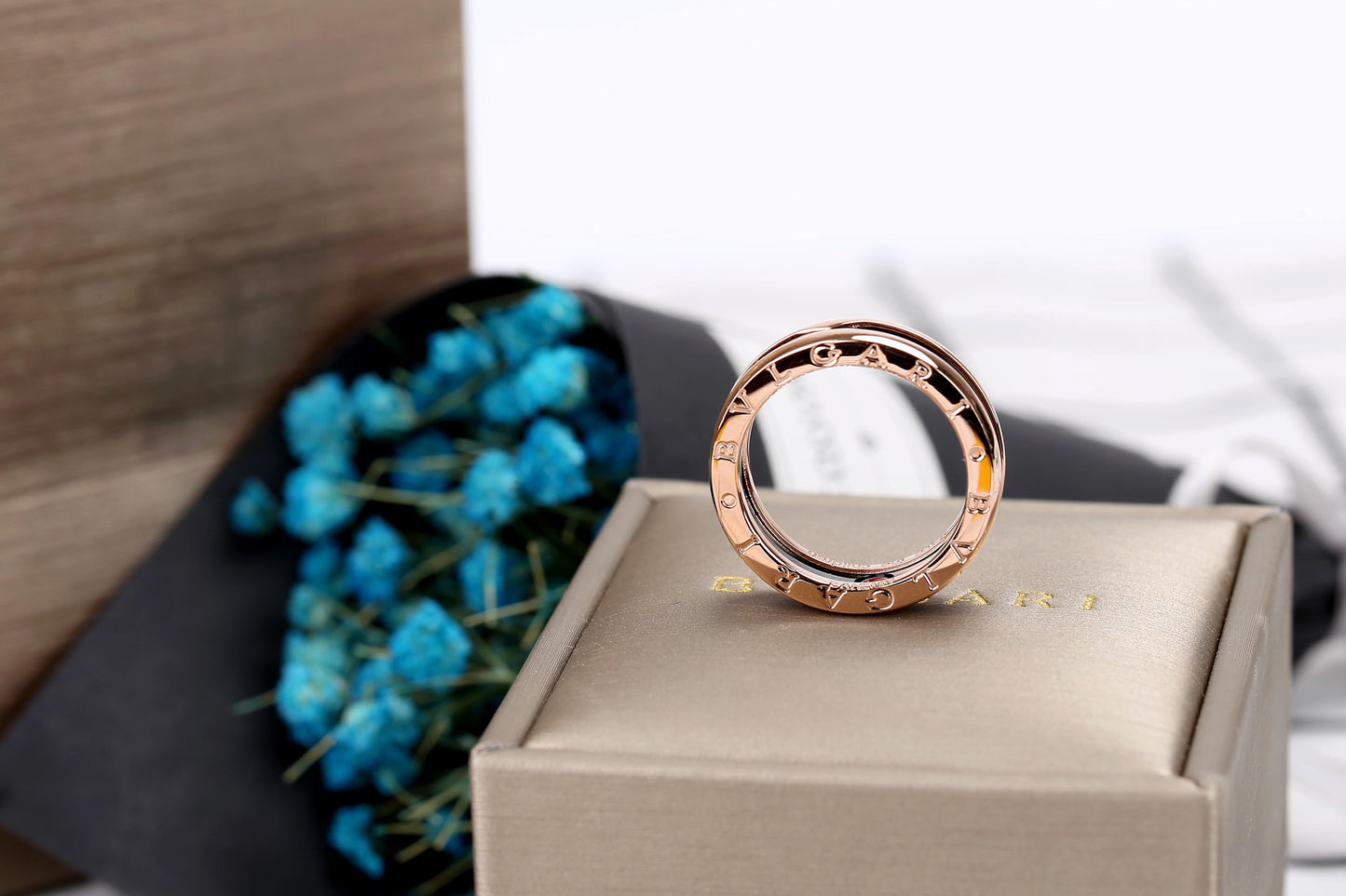 B.zero1 two-band ring with two 18 kt rose gold loops and a black ceramic spiral.